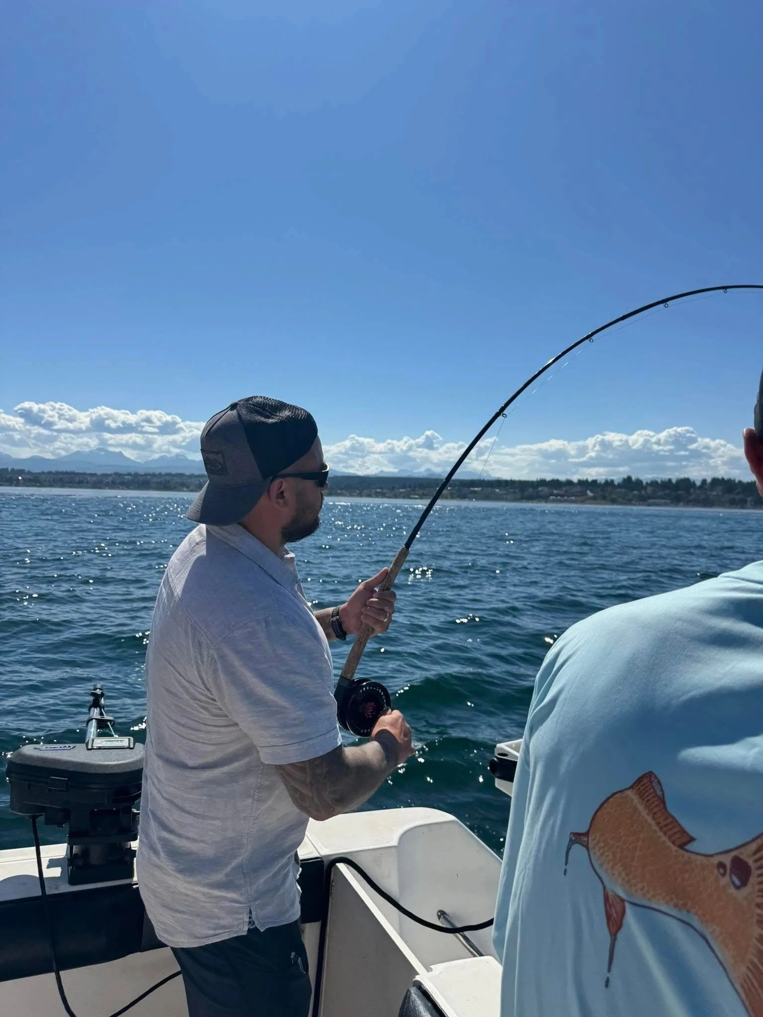 Angler Fighting Fish with Bent Rod
