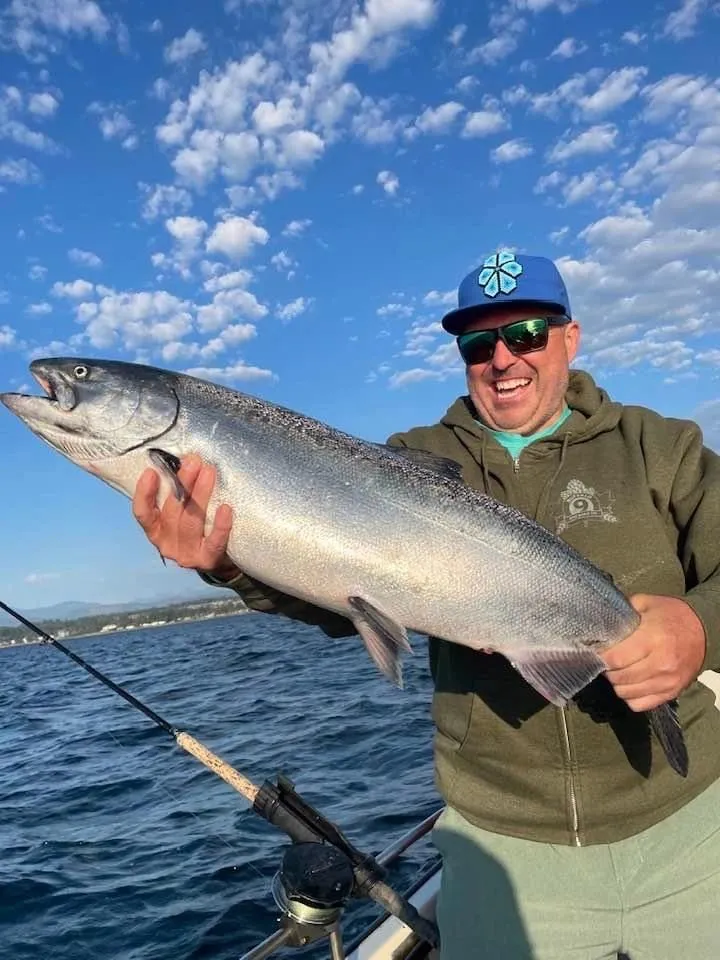 Happy Angler with Chinook Salmon