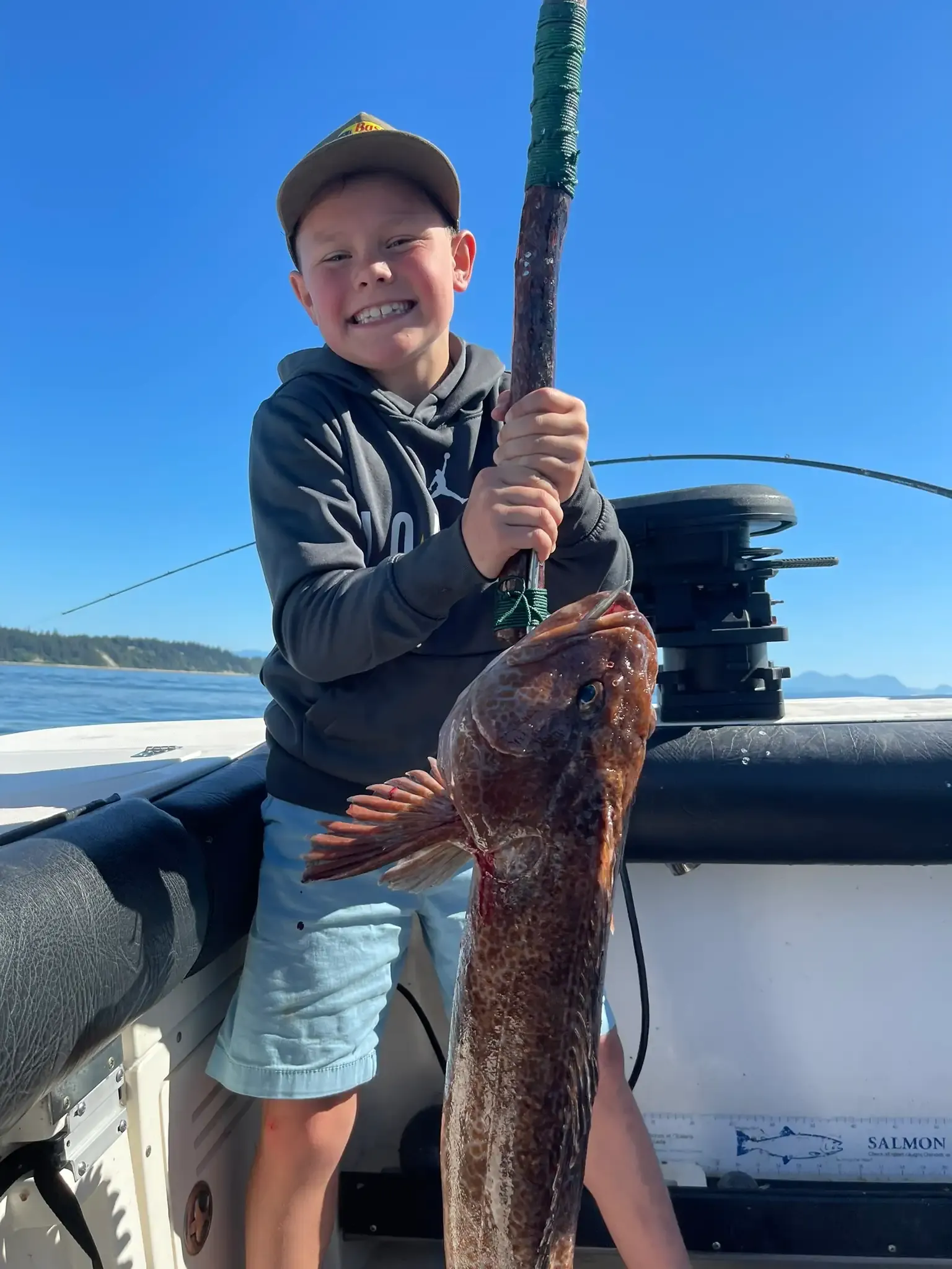 Captain Jason with trophy Lingcod